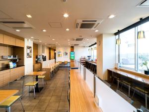 ห้องอาหารหรือที่รับประทานอาหารของ Super Hotel Niihama