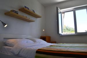 Postel nebo postele na pokoji v ubytování Apartment Viska