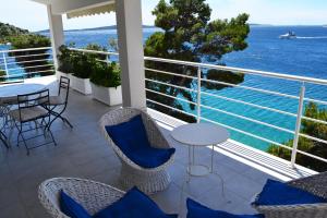 a balcony with a view of the ocean at Apartment Viska in Tribunj