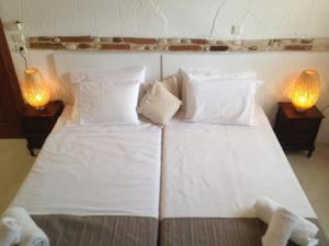 Posteľ alebo postele v izbe v ubytovaní Auberge 32 Old Town
