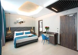 Voodi või voodid majutusasutuse The Hive Hotel toas