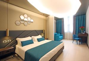 Voodi või voodid majutusasutuse The Hive Hotel toas