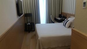 Кровать или кровати в номере Gran Hotel Sardinero
