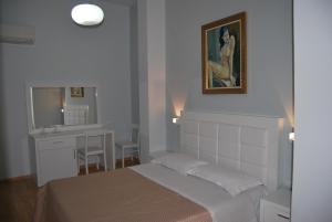 Letto o letti in una camera di Hotel & Restaurant White City
