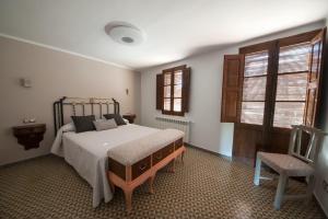 Un pat sau paturi într-o cameră la Casa Dominica