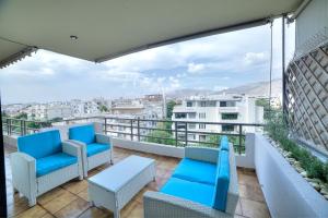 A balcony or terrace at Athens Glyfada Riviera Apartment