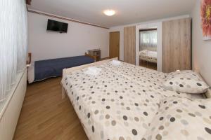 Postel nebo postele na pokoji v ubytování Rooms Ivan