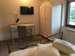 TV a/nebo společenská místnost v ubytování B&B Elena
