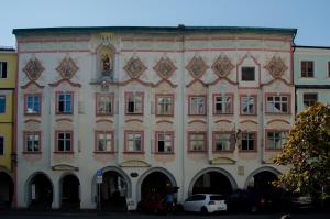 a large building with a lot of windows at Hotel Paulanerstuben in Wasserburg am Inn