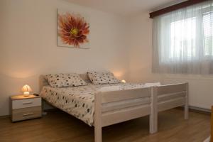 Postel nebo postele na pokoji v ubytování Rooms Ivan