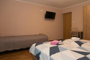 Postel nebo postele na pokoji v ubytování Rooms Ivan
