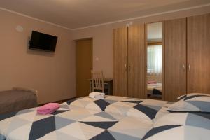 Postel nebo postele na pokoji v ubytování Rooms Ivan