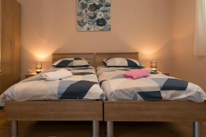 Postel nebo postele na pokoji v ubytování Rooms Ivan