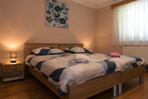 Postel nebo postele na pokoji v ubytování Rooms Ivan