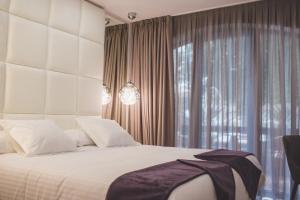 Hotel Cuevas - Adults Only客房内的一张或多张床位