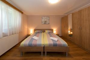 Postel nebo postele na pokoji v ubytování Rooms Ivan