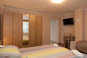 Postel nebo postele na pokoji v ubytování Rooms Ivan