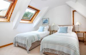 A bed or beds in a room at Stay at Penny's Mill 