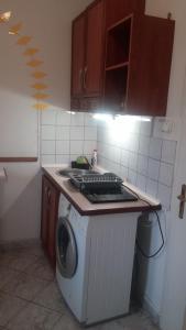Kuchyň nebo kuchyňský kout v ubytování All-Inn