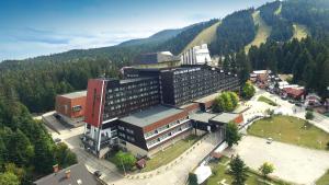 an aerial view of a large building in the mountains at Hotel Samokov in Borovets