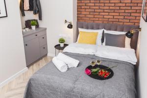 Posteľ alebo postele v izbe v ubytovaní Agnes Apartments Old Town