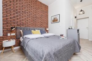 Posteľ alebo postele v izbe v ubytovaní Agnes Apartments Old Town