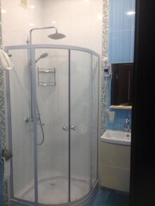 Ванная комната в Elion Hotel