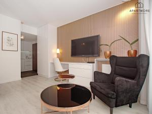 Televízia a/alebo spoločenská miestnosť v ubytovaní City Center - Riverside by Apartmore