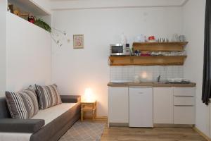 Kuchyň nebo kuchyňský kout v ubytování Studio Apartments Plitvice Lacus