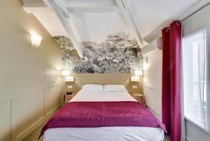 Ein Bett oder Betten in einem Zimmer der Unterkunft Passy Eiffel