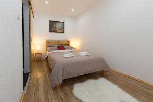 Postel nebo postele na pokoji v ubytování Studio Apartments Plitvice Lacus