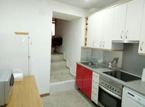 Majoituspaikan Apartamentos Caleros keittiö tai keittotila