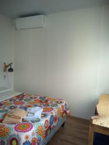 Ein Bett oder Betten in einem Zimmer der Unterkunft Limón y Sal