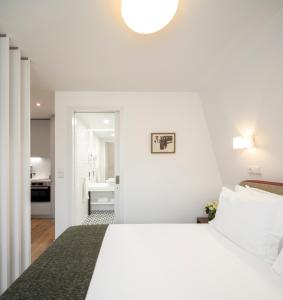 Voodi või voodid majutusasutuse Lisbon Serviced Apartments - Chiado Emenda toas