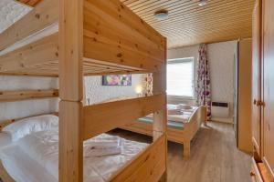 En eller flere senge i et værelse på In Winterberg