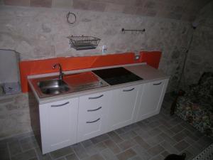 Kuchyň nebo kuchyňský kout v ubytování Masseria del Ponte