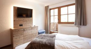 Łóżko lub łóżka w pokoju w obiekcie Living-Apart Anita