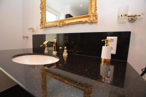 Ein Badezimmer in der Unterkunft Ferienhaus Merzijana