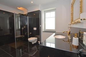 Ein Badezimmer in der Unterkunft Ferienhaus Merzijana