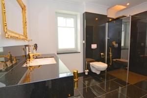 Ein Badezimmer in der Unterkunft Ferienhaus Merzijana