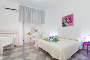 Posteľ alebo postele v izbe v ubytovaní San Nicola B&B