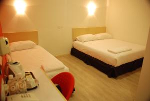 Cama o camas de una habitación en Old Penang Hotel - Penang Times Square
