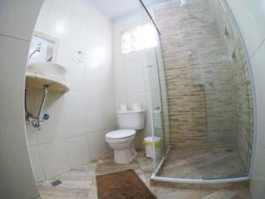Koupelna v ubytování Suítes Cantinho da Pedra