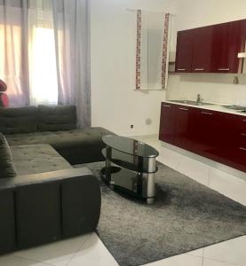 a living room with a couch and a table at Hotel Venice Tour in Mestre