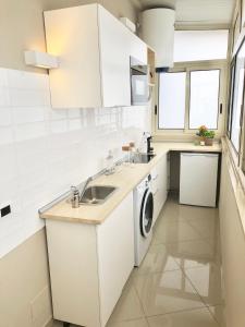 A kitchen or kitchenette at Giader's House - Free Parking
