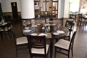 מסעדה או מקום אחר לאכול בו ב-Apartamentos Cabrita