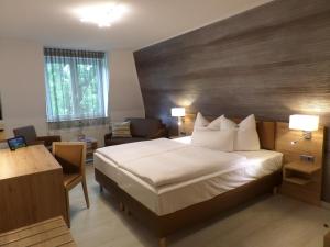 Postel nebo postele na pokoji v ubytování C-YOU Hotel Chemnitz + 37 fotografií