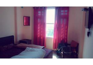 Postel nebo postele na pokoji v ubytování Budget Friendly Rooms in Shimla