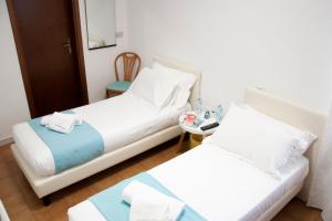 Кровать или кровати в номере Hotel del Mar