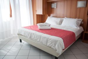 Кровать или кровати в номере Hotel del Mar